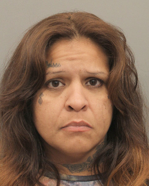 ARRESTED: Booking photo of Laura Barrios, 39, now in custody and charged with murder in the May 2007 fatal stabbing of a man at 16826 City View Place.