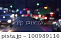 Bokeh of street evening lights, night city with car lights. 100989116