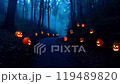 Pathway of Glowing Jack-o'-Lanterns in Haunted Forest 119489820