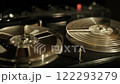 Retro Tape Recorder Reels Spinning in Dark 122293279