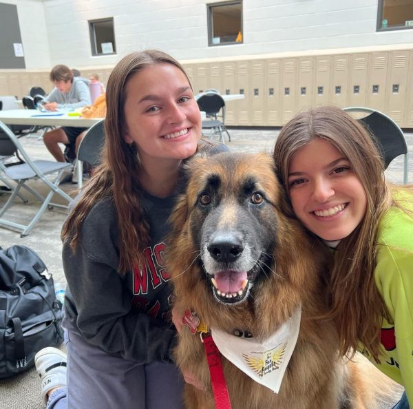 Two former Adams students enjoying Fur Angel, Oberon. (Photo credit: @oberonoflostlakewoods on Instagram)