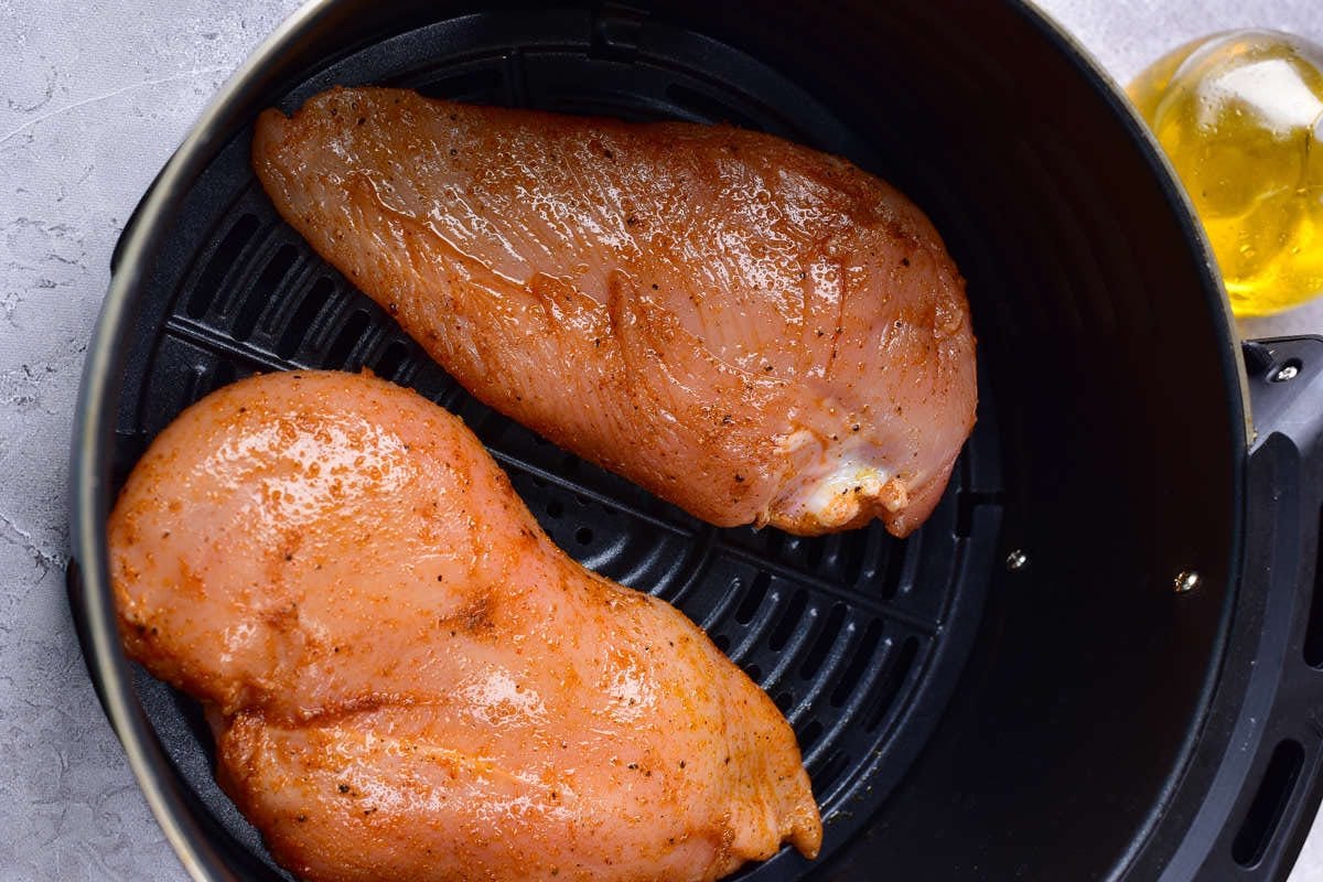 raw chicken breasts in the air fryer.