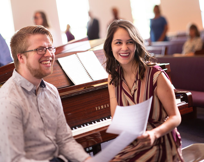 people at piano