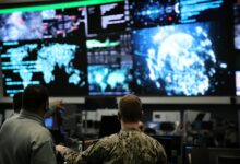 U.S. Cyber Command members work in the Integrated Cyber Center, Joint Operations Center at Fort George G. Meade.