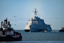 Under the guidance of two tugboats, USS Savannah (LCS 28) enters the harbor at Naval Surface Warfare Center, Port Hueneme Division (NSWC PHD) in California on Feb. 9 for a Combat Systems Assessment Team event