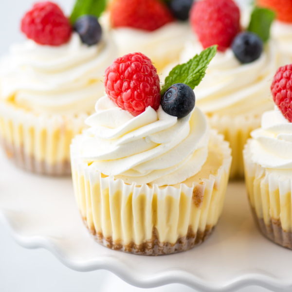 Closeup of a cheesecake cupcake on cake stand