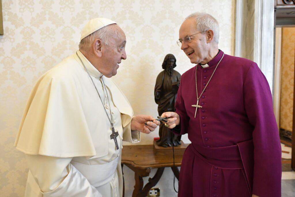 Pope Francis meets with Anglican Archbishop Justin Welby of Canterbury in the library of the Apostolic Palace at the Vatican on September 30, 2023, ahead of an ecumenical prayer vigil for the Synod of Bishops in St. Peter's Square.