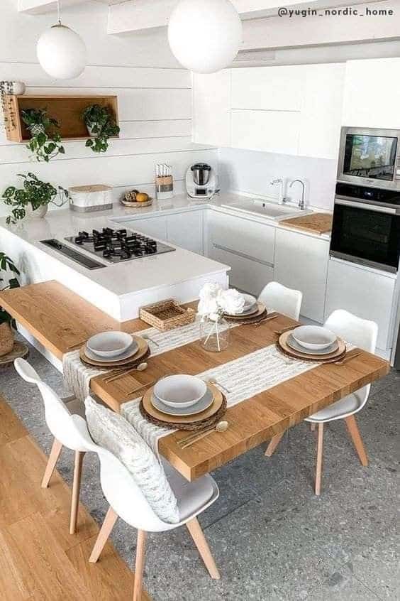 small kitchen with wooden table