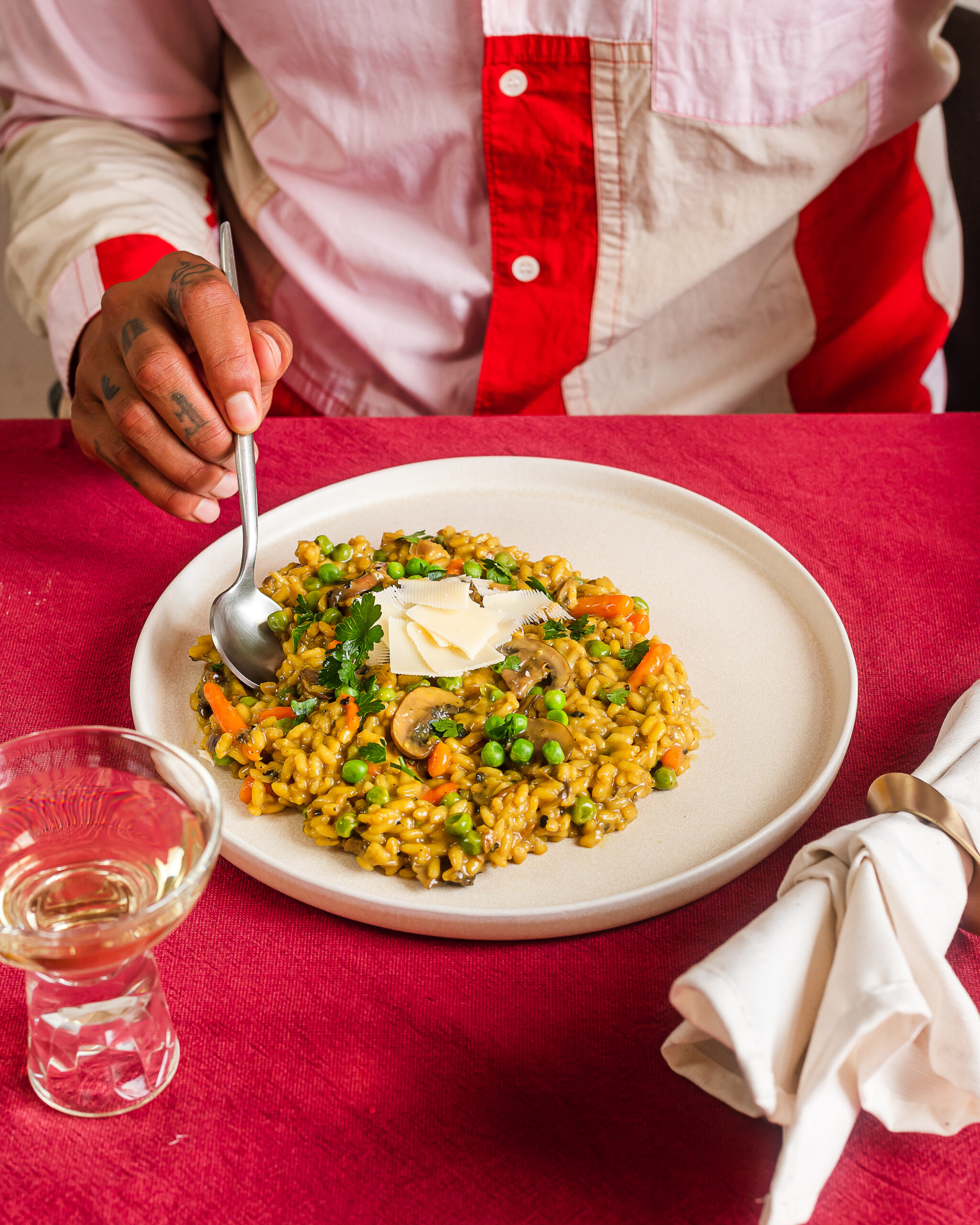 Eating a plate with mushroom risotto