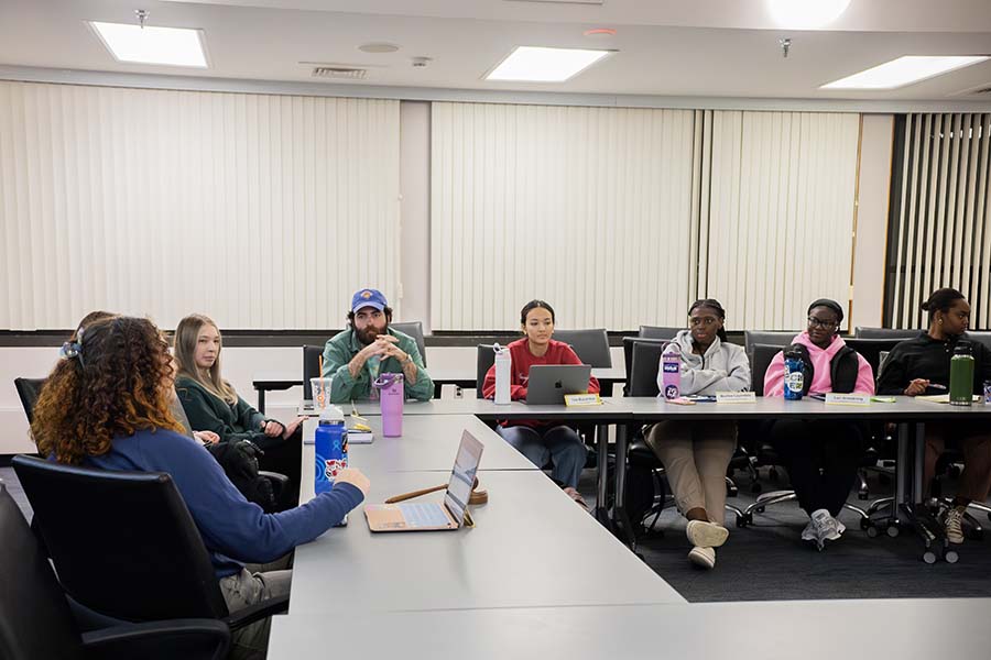 Nikki Sutera addresses members from the Ithaca College Student Governance Council. The council spoke with Caryanne Keenan, director of New Student and Transition Programs.