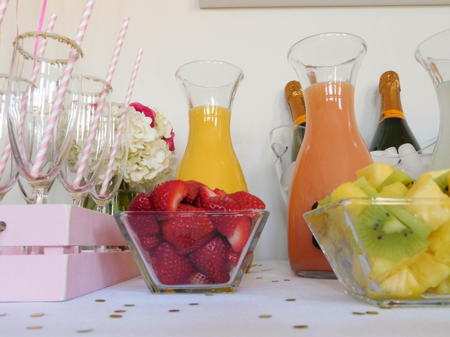 A colorful and glam DIY mimosa bar brunch