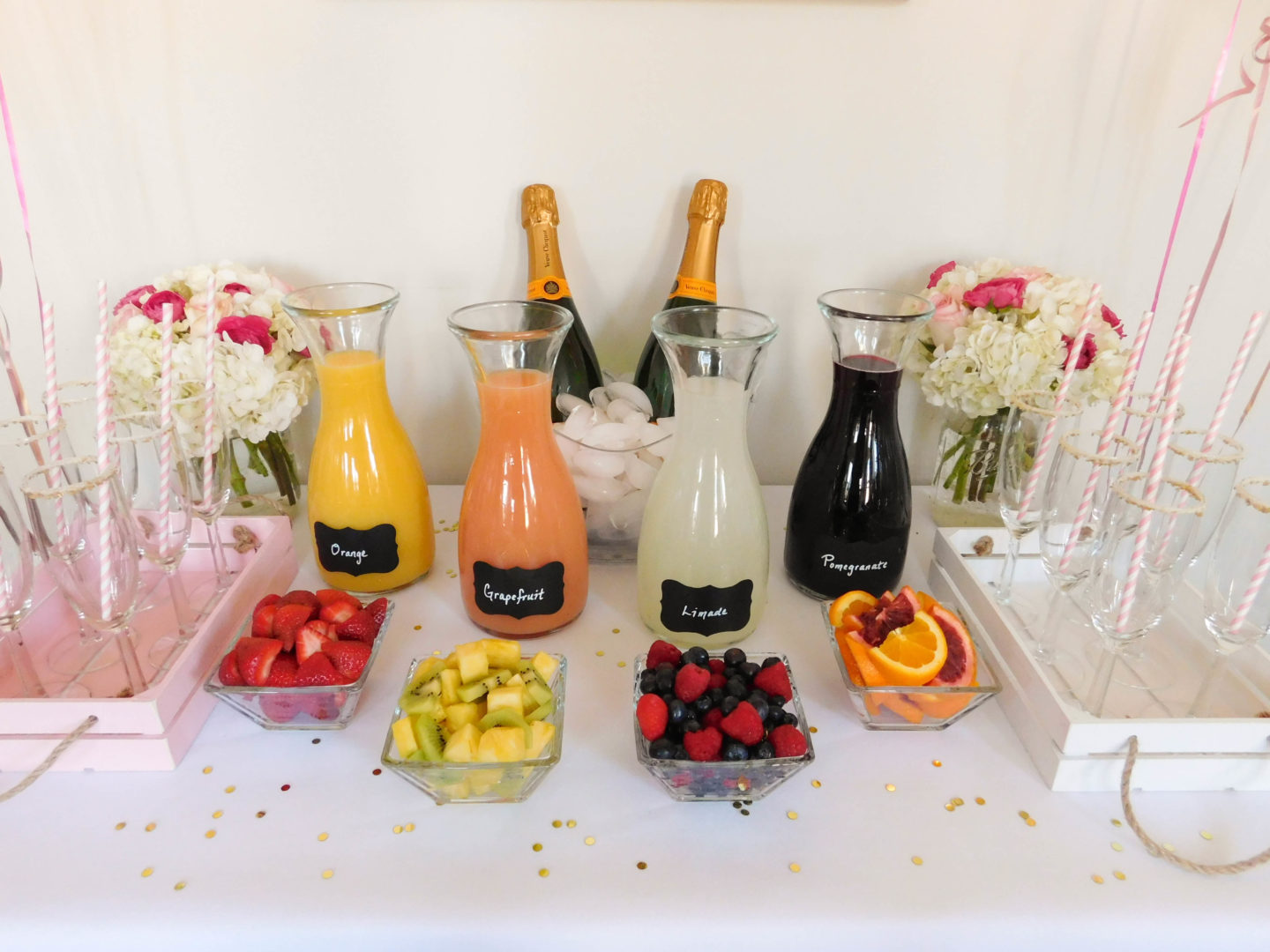 A colorful and glam DIY mimosa bar brunch