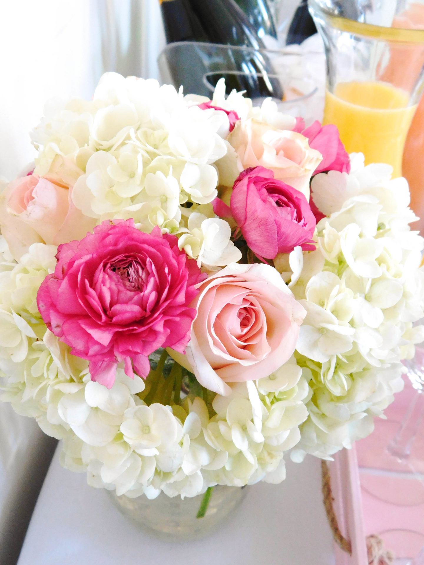 A colorful and glam DIY mimosa bar brunch