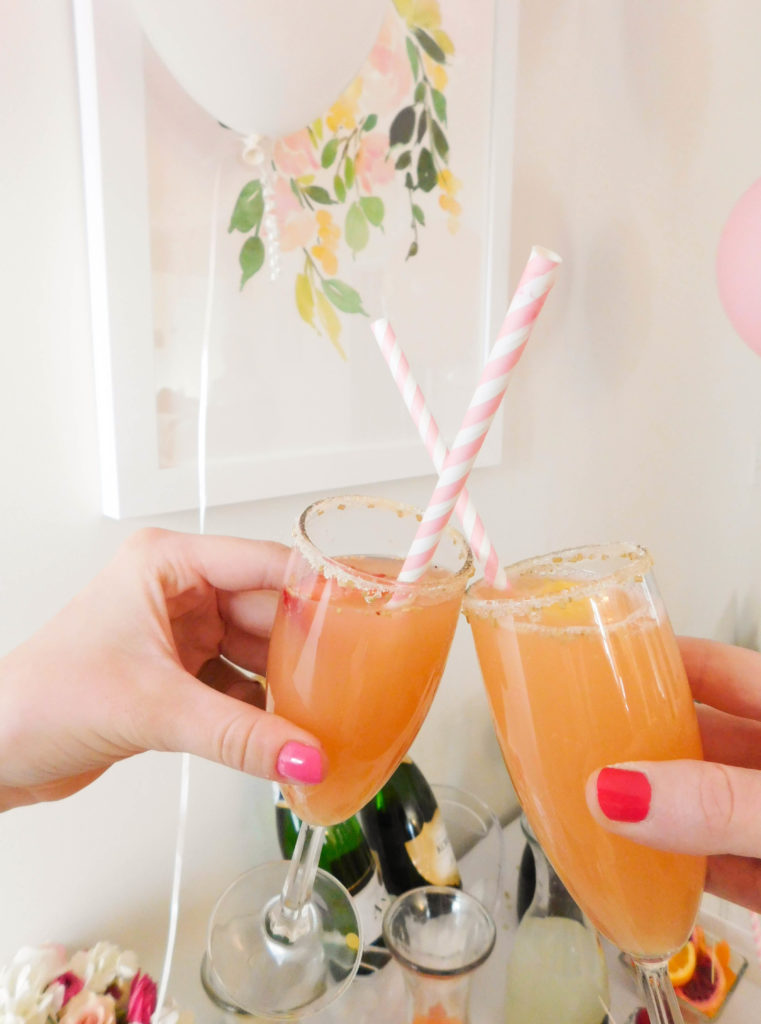 A colorful and glam DIY mimosa bar brunch