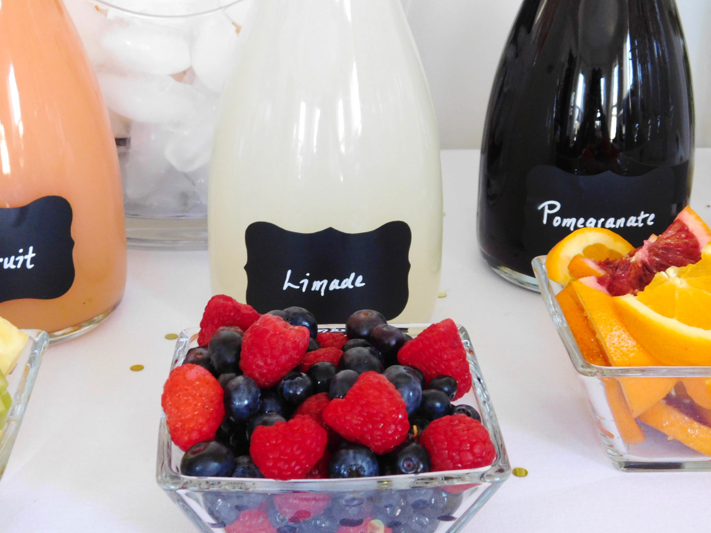 A colorful and glam DIY mimosa bar brunch