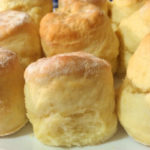 Scones on a white plate.