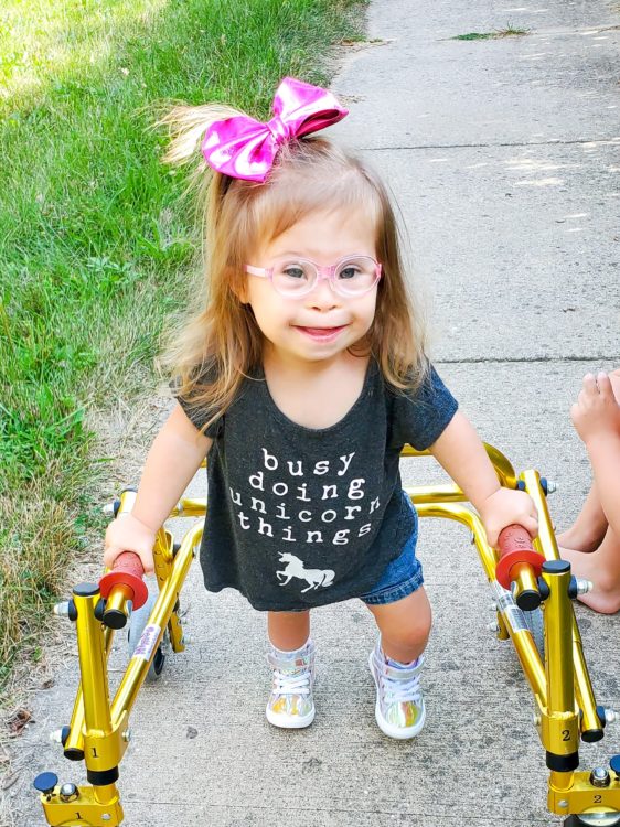 Ivy using her yellow walker.