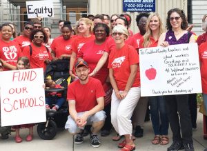 Rachele Fruit, right, candidate for Georgia governor from Atlanta, brings solidarity from fellow Walmart workers to June 7 teachers protest outside Guilford County Commission hearing in Greensboro, North Carolina. Left, Dan Fein, candidate for governor of Illinois from Chicago, joins march and rally June 23 at Waters Elementary School protesting attacks on immigrant workers.