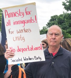 Dan Fein, candidate for governor of Illinois from Chicago, joins march and rally June 23 at Waters Elementary School protesting attacks on immigrant workers.