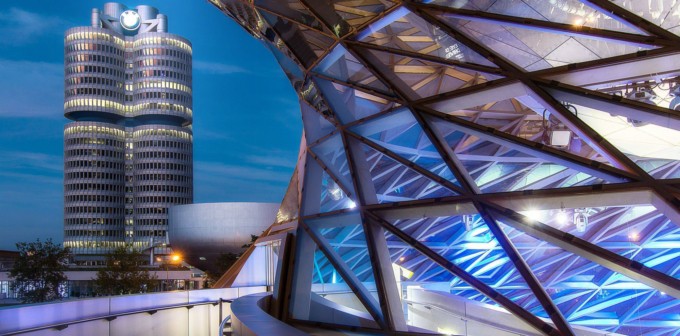 glass roof of the Olympiastadion in Munich with BMW building in the background