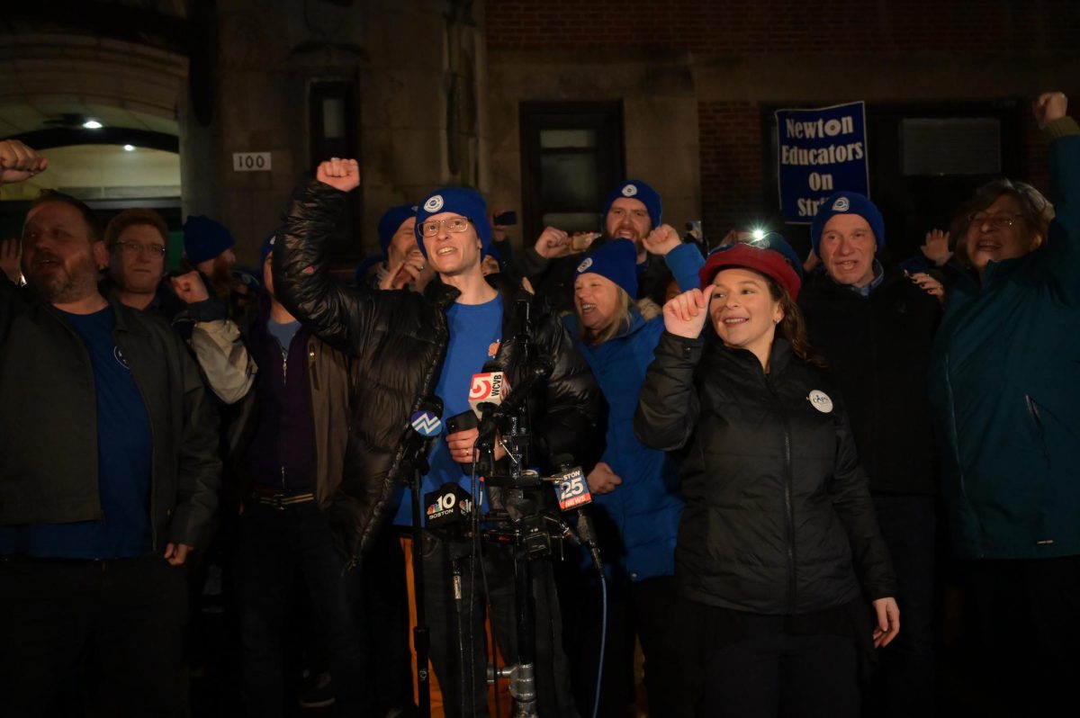 South teacher Ryan Normandin delivers a speech announcing the end of the Newton Teachers Association (NTA) strike, Friday, Feb. 2.