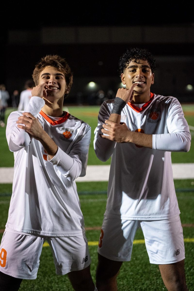 Seniors Marco Comin and Seth Rao pose post-win Tuesday, Nov. 20. 