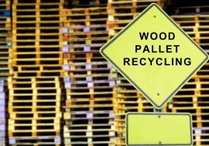 An image of stacked pallets for an article about "free wood pallets near me."