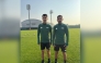 Qatar's International referees Abdulrahman Al Jassim (left) and Salman Falahi pose for a photo.