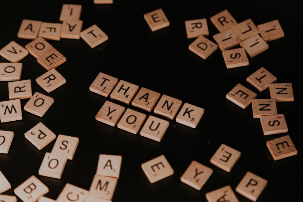 there are a lot of wooden puzzles, and there are saying thank you