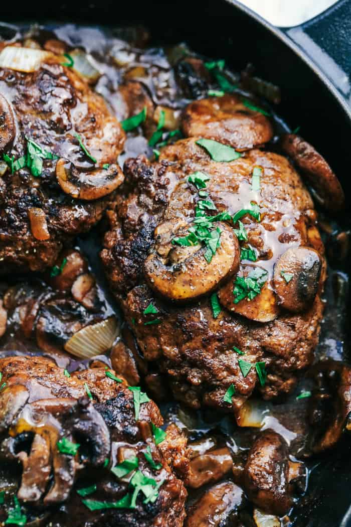 Skillet Salisbury Steak close up in a cast iron pan.