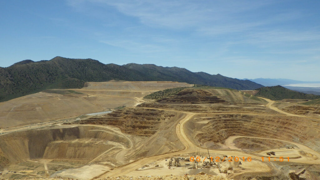 Massive pits show where sand and gravel have been mined