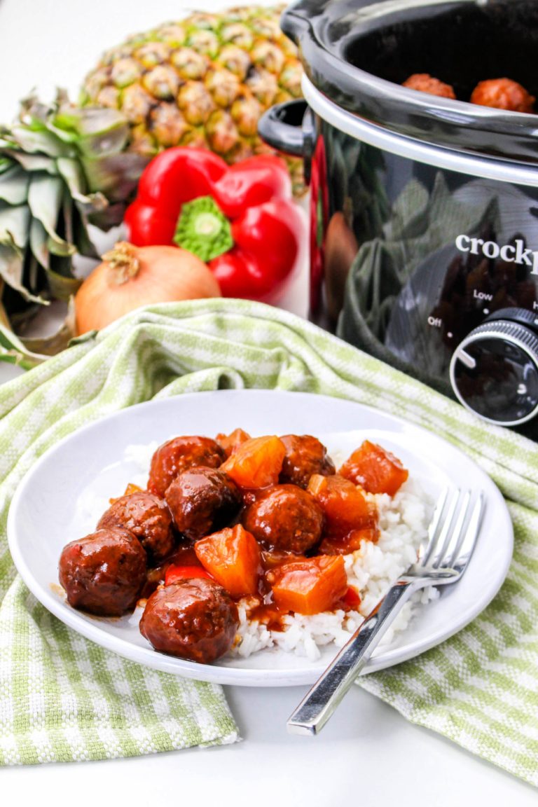 Crockpot Pineapple Barbecue Meatballs on a plate with rice