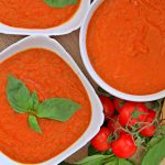 easy tomato basil soup in white bowls