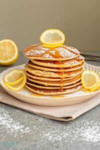 Fluffy, zesty, and packed with creamy flavor, lemon Greek yogurt pancakes are the perfect breakfast treat!