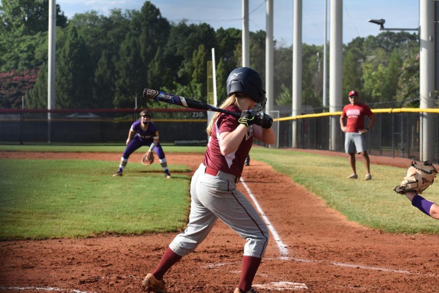 Sophomore Megan Bookspun gets into her stance in a 15-0 loss against Villa Rica on Aug. 11.