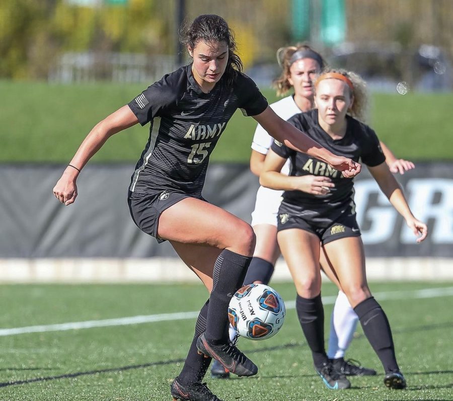 West Point USMA striker Kaitlin Palaian attacks the ball against Loyola University- Maryland. 