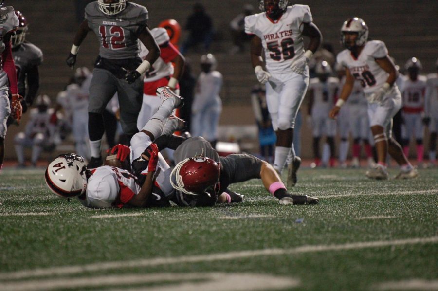 Sophomore Jude Paulson tackling a Stone Mountain player on Oct. 28.