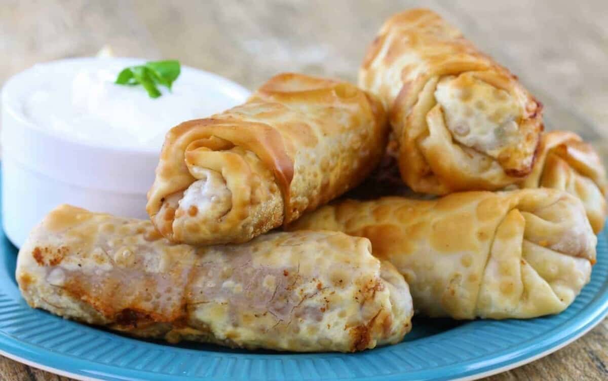 Mexican Eggrolls on a blue plate.