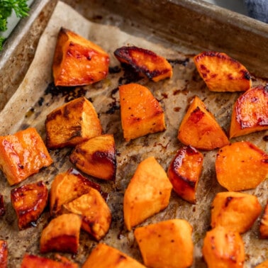 Close up view of sweet potato cubes.