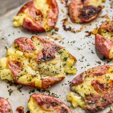 Close up view of garlic herb smashed potatoes.