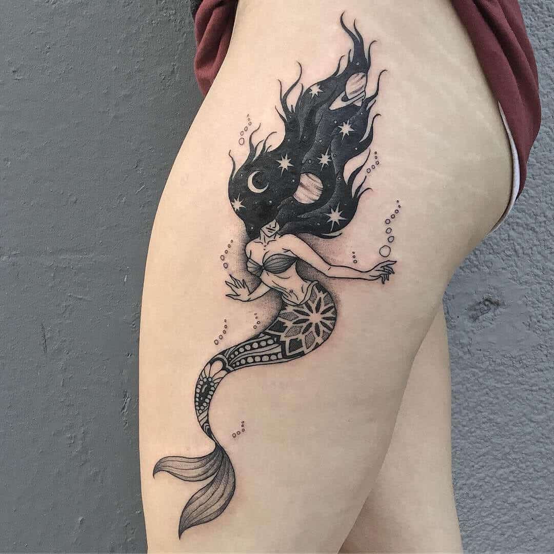 mermaid tattoo on thigh