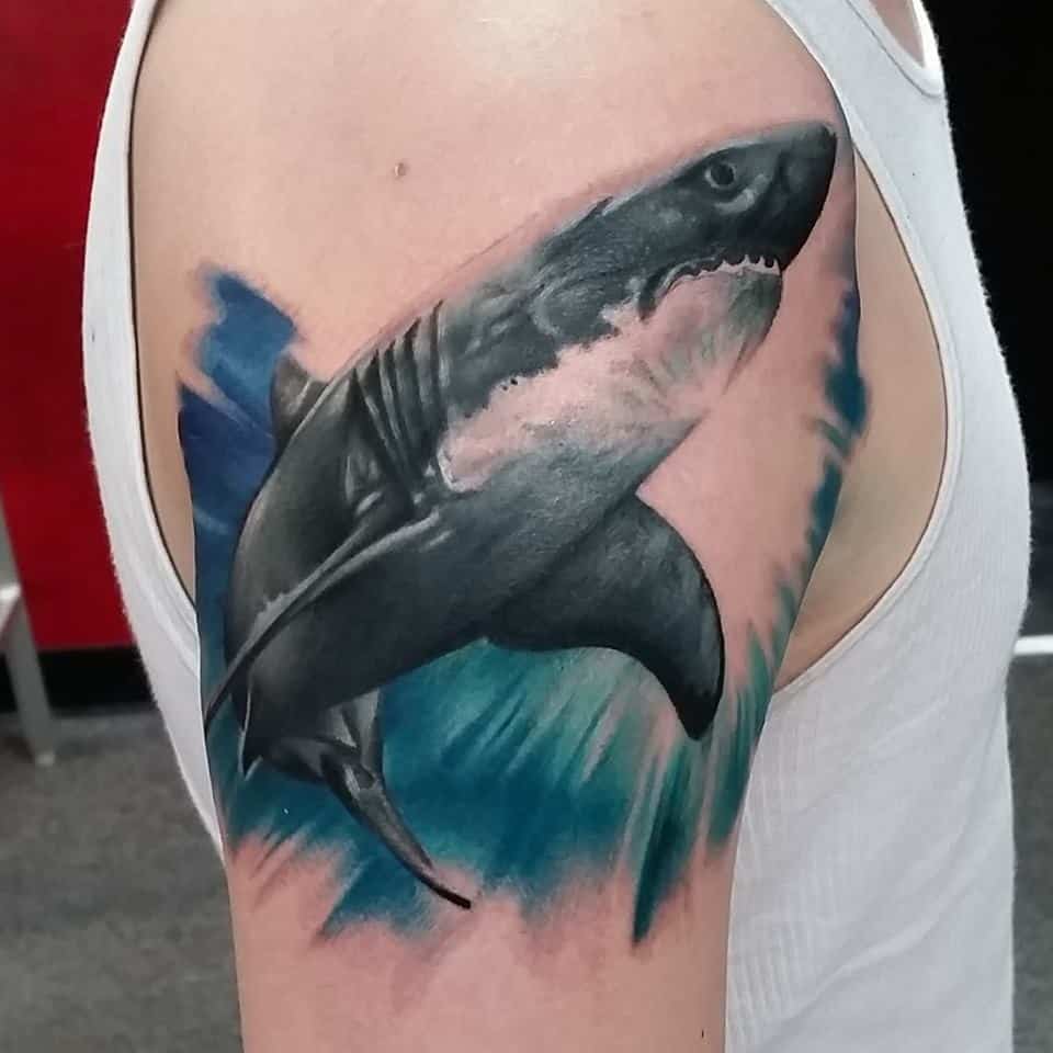 watercolor shark tattoo on arm