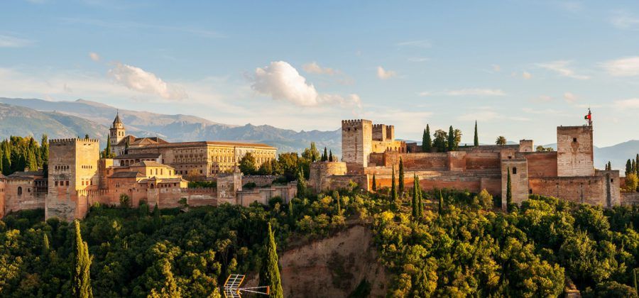 Exterior of Alhambra in Granada during sunset.