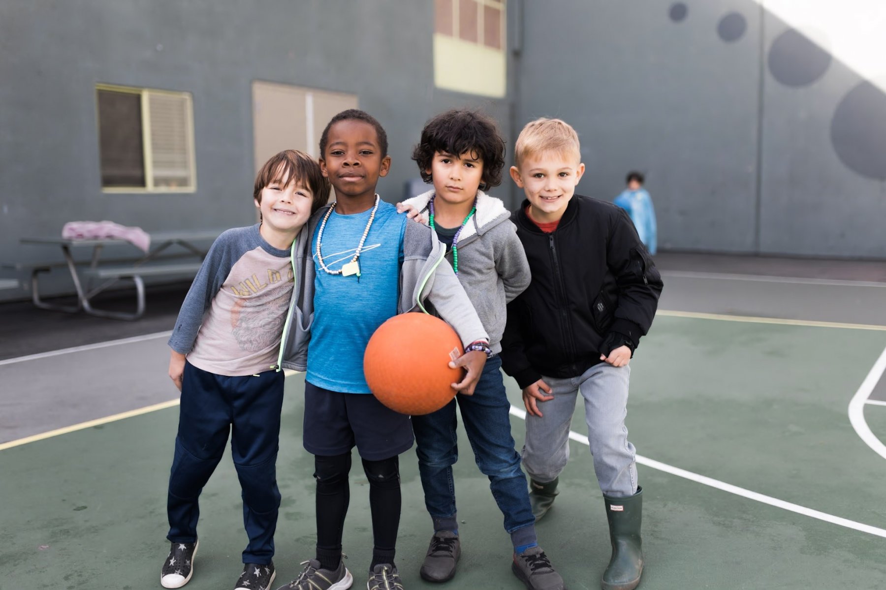 ES basketball court boy students ball