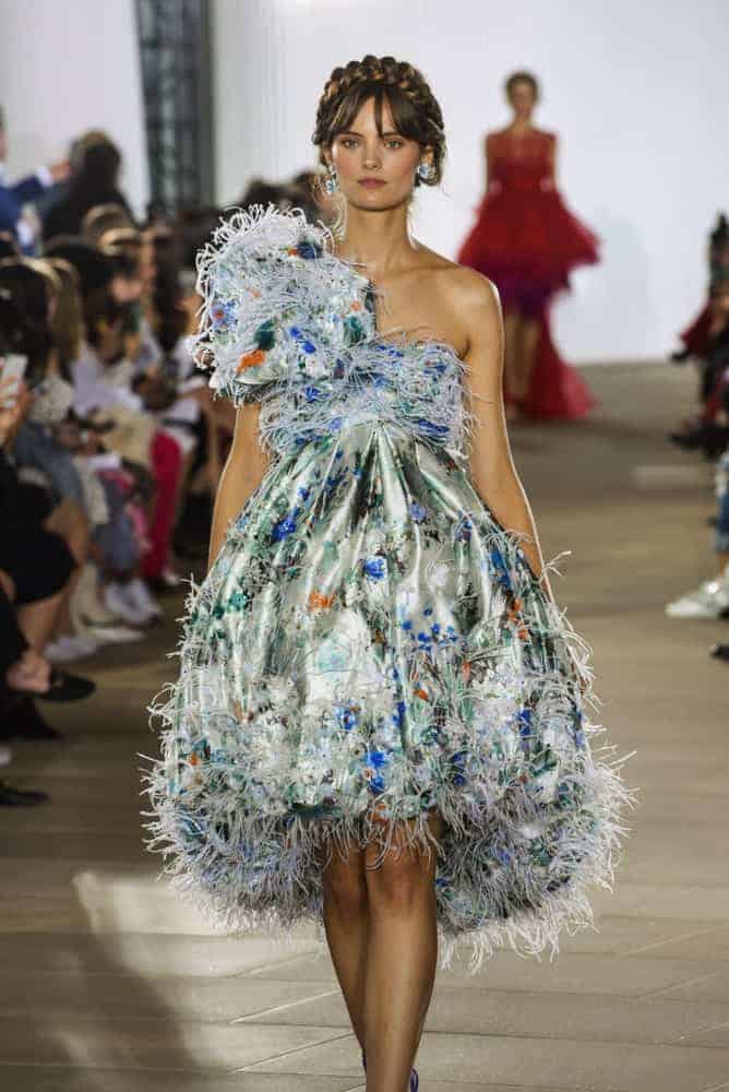 Woman slaying the runway with her balloon dress.