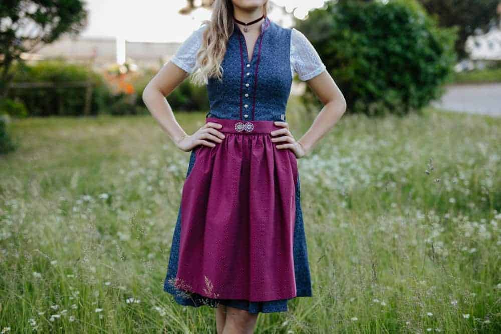 Woman wearing a dirndl skirt.