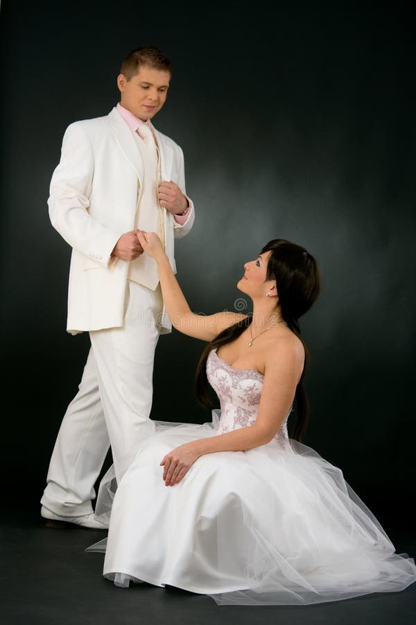 Bride and groom in wedding dress