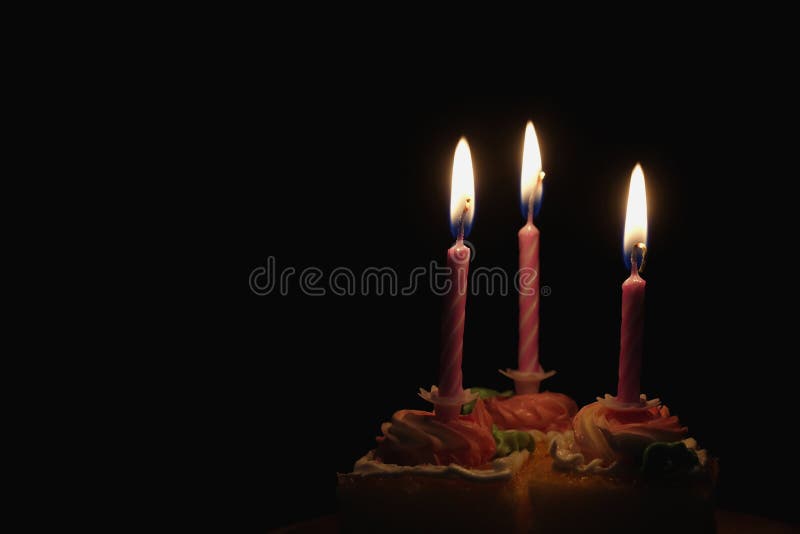 Burning Candle on Cake in Black Background Stock Photo - Image of cream,  confection: 146721514