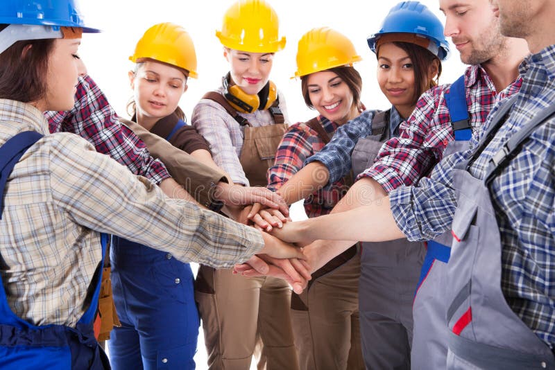 Diverse Group of Construction Workers Stacking Hands Stock Image ...