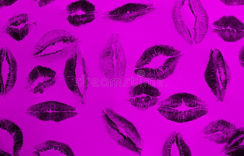 Kiss many traces of lipstick on a purple background